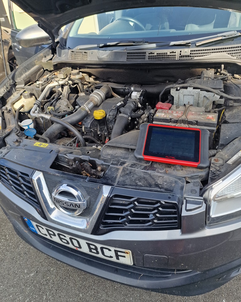 305504250_476968764443026_964956638065078685_n MOT check in side of Nissan car